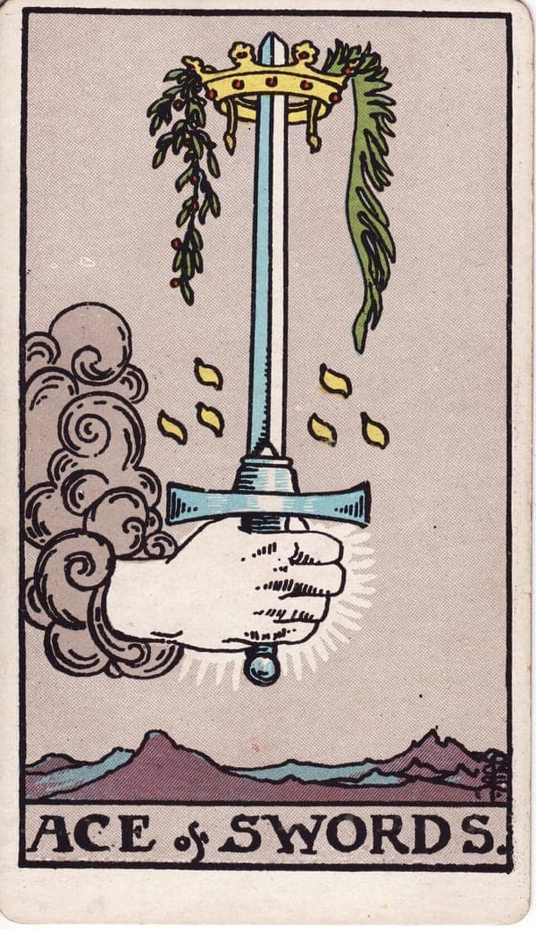 Ace of Swords tarot card: A hand from a cloud grips an upright double-edged sword, its point passing through a golden crown hung with laurel and palm — victory and clarity crowning raw intellect.