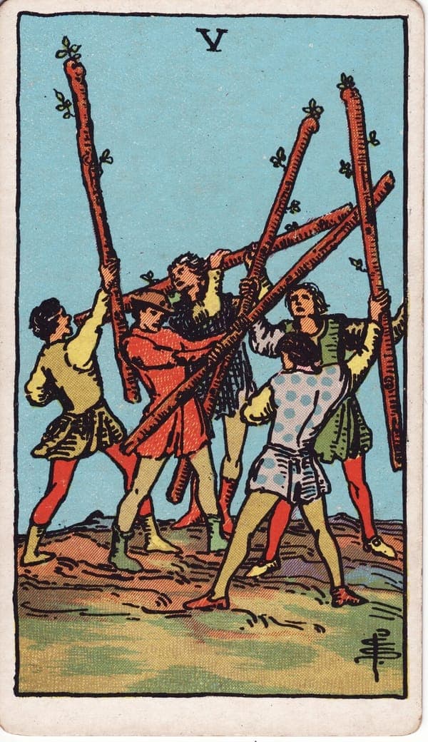 Five of Wands tarot card: Five youths in mismatched clothes swing five wands in a tangle — every stave raised, none landing a real blow.