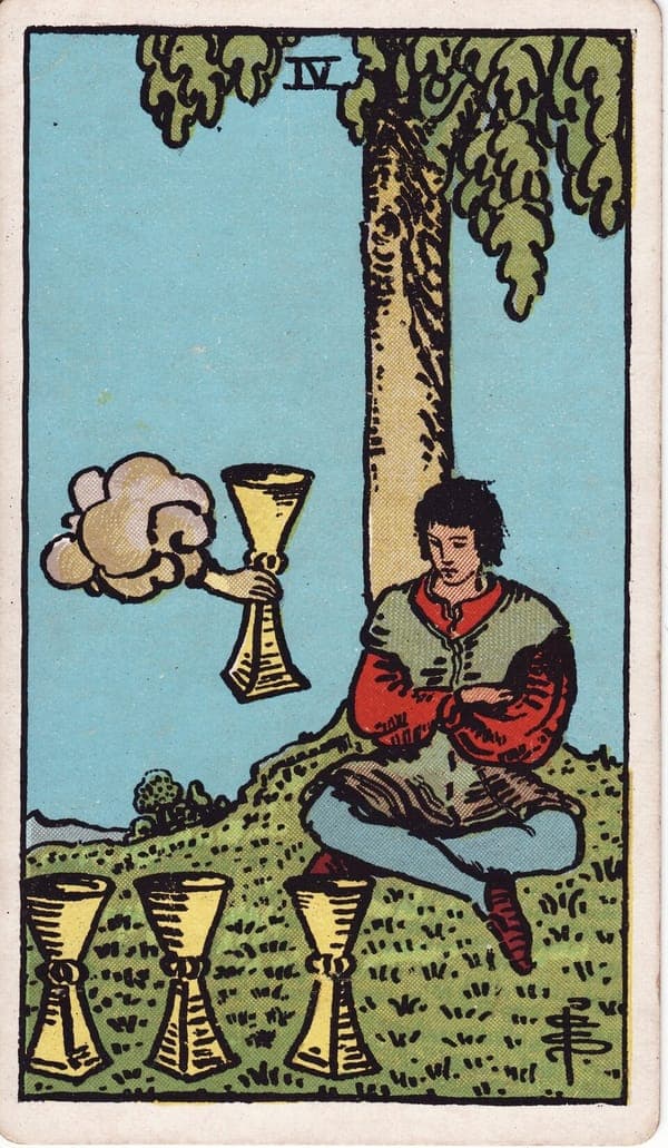 Four of Cups tarot card: A young figure sits cross-armed and cross-legged beneath a tree on a hilltop, eyes down.