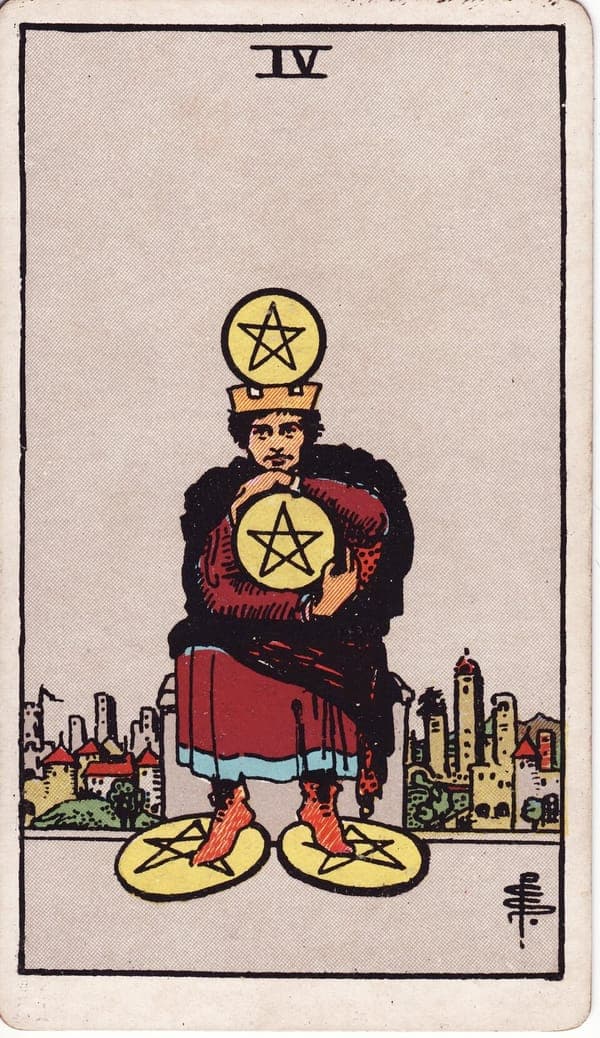 Four of Pentacles tarot card: A crowned figure sits on a plain stone bench, a coin balanced on his crown, another hugged to his chest with both arms, one pinned beneath each foot — wealth deployed as armor on every chakra it can reach.