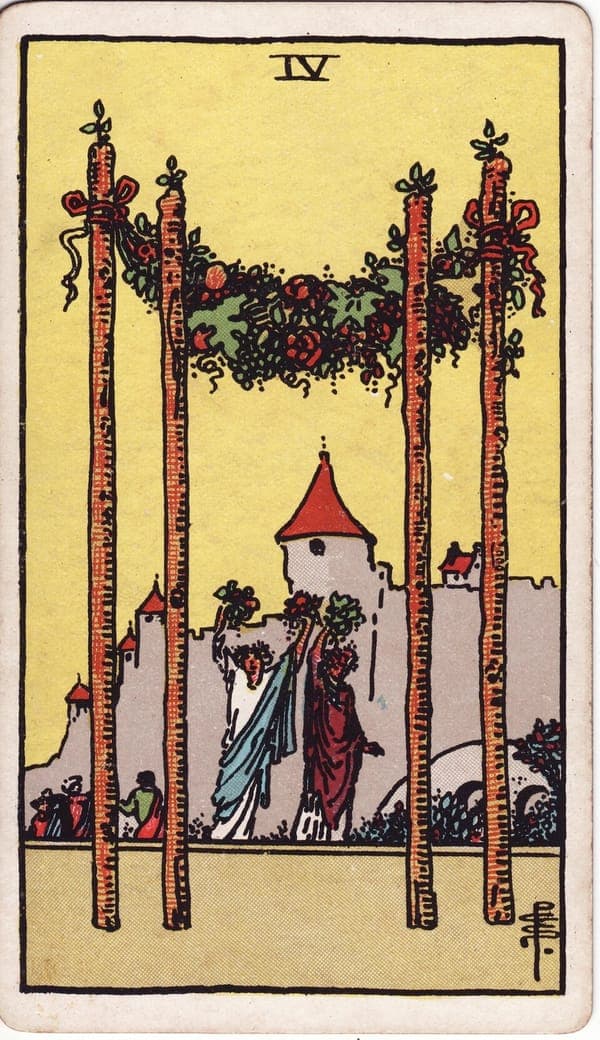 Four of Wands tarot card: Four tall wands stand planted like the posts of a doorway, garlanded with flowers and fruit — a canopy with no walls, open on every side.