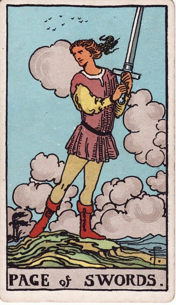 Page of Swords tarot card: On a windswept rise, a young figure holds a sword upright in both hands while glancing back over one shoulder — guard and curiosity in a single posture.