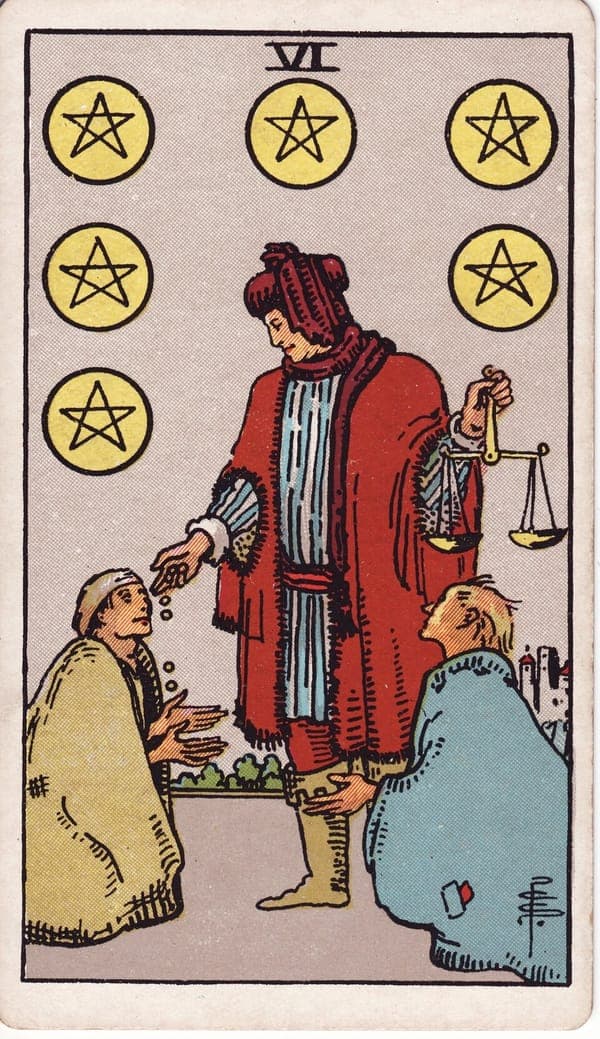 Six of Pentacles tarot card: A richly dressed merchant holds balanced scales in one hand while the other drops coins into a kneeling beggar's palms; a second figure kneels waiting.