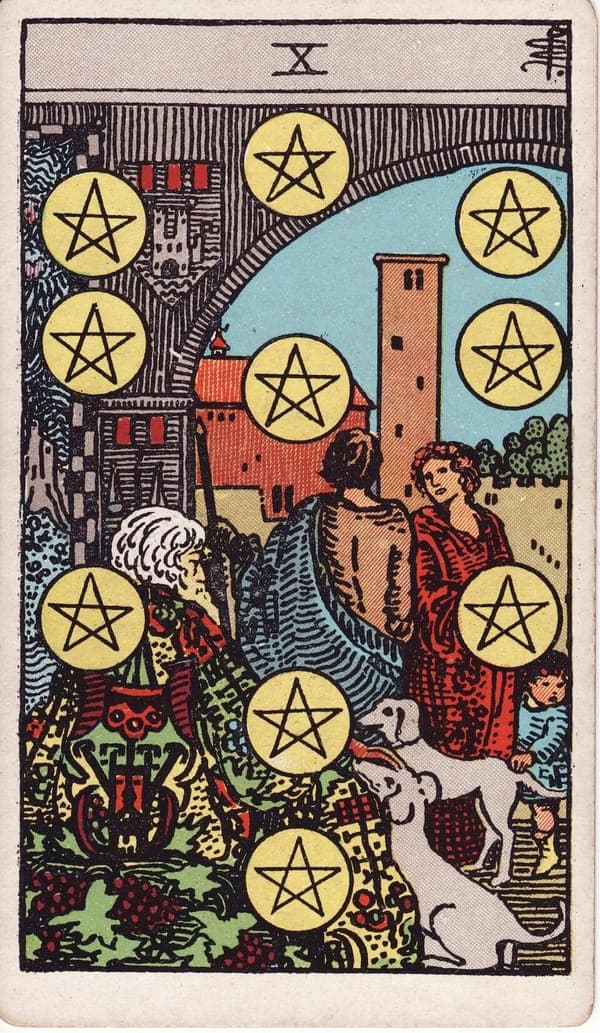 Ten of Pentacles tarot card: Under a stone archway carved with heraldry, a white-bearded elder in a robe of vines and crescents rests among his hounds while a couple stands in conversation and a child reaches for a dog's tail — three generations, none looking at the viewer, all held by the same walls.